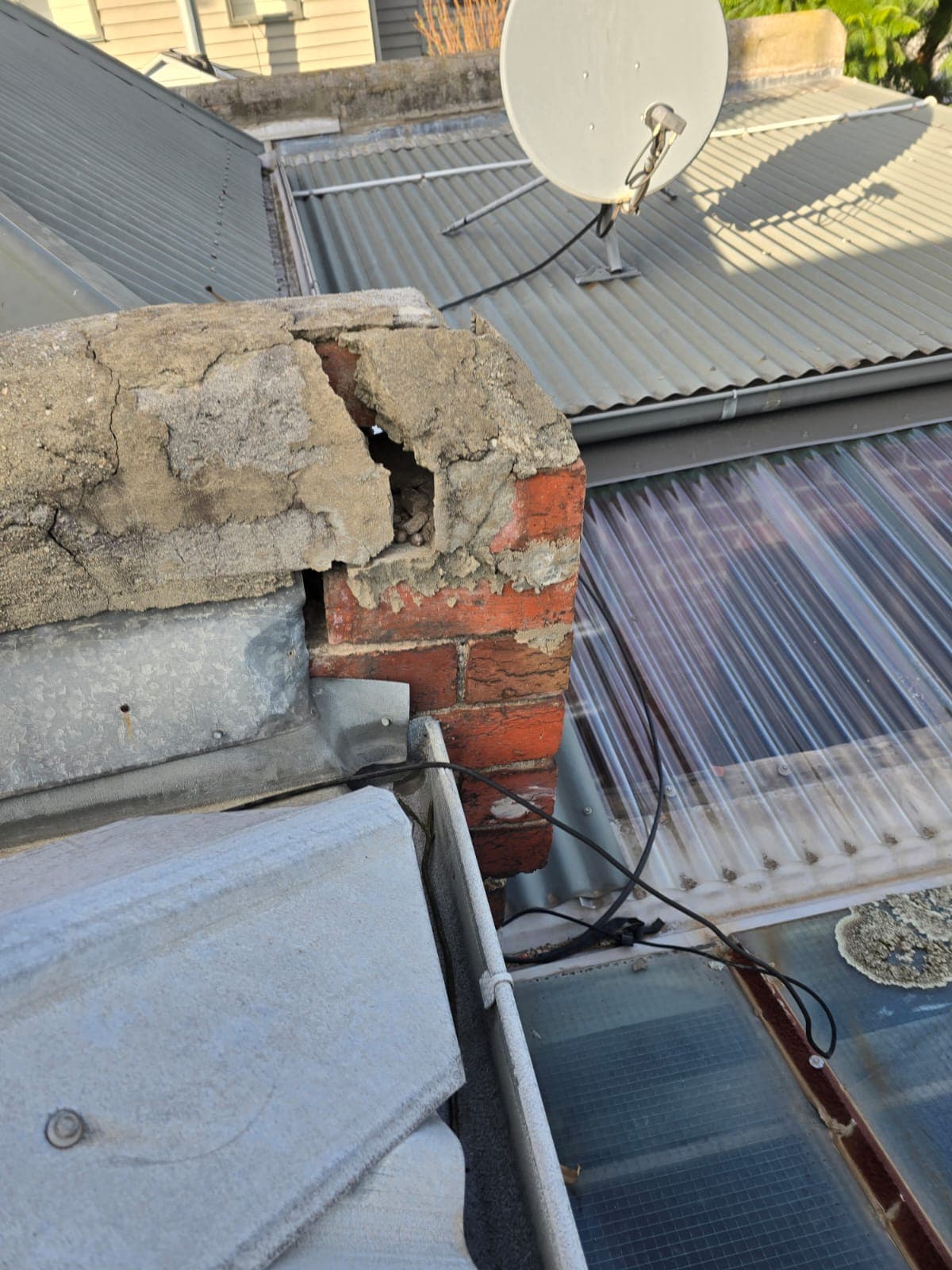 Heritage chimney crown before remedial repair on a Hawthorn period home by Goodwin Bricklaying