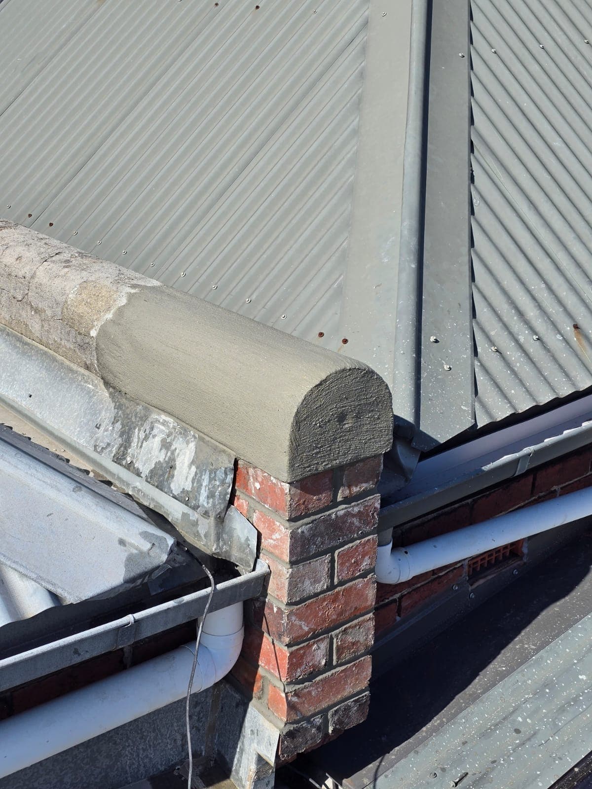 Heritage chimney stack rebuilt with new capping on a Richmond terrace by Goodwin Bricklaying