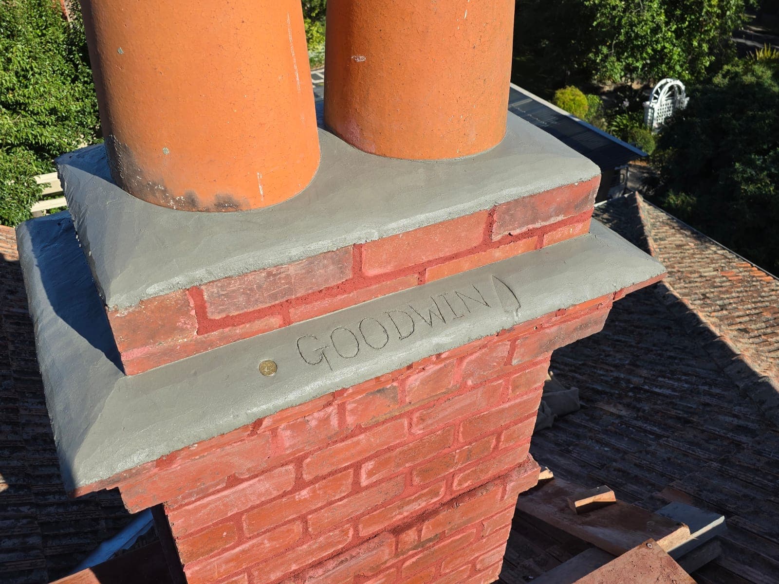 Restored twin-pot heritage chimney with Goodwin capping detail on a Hawksburn home