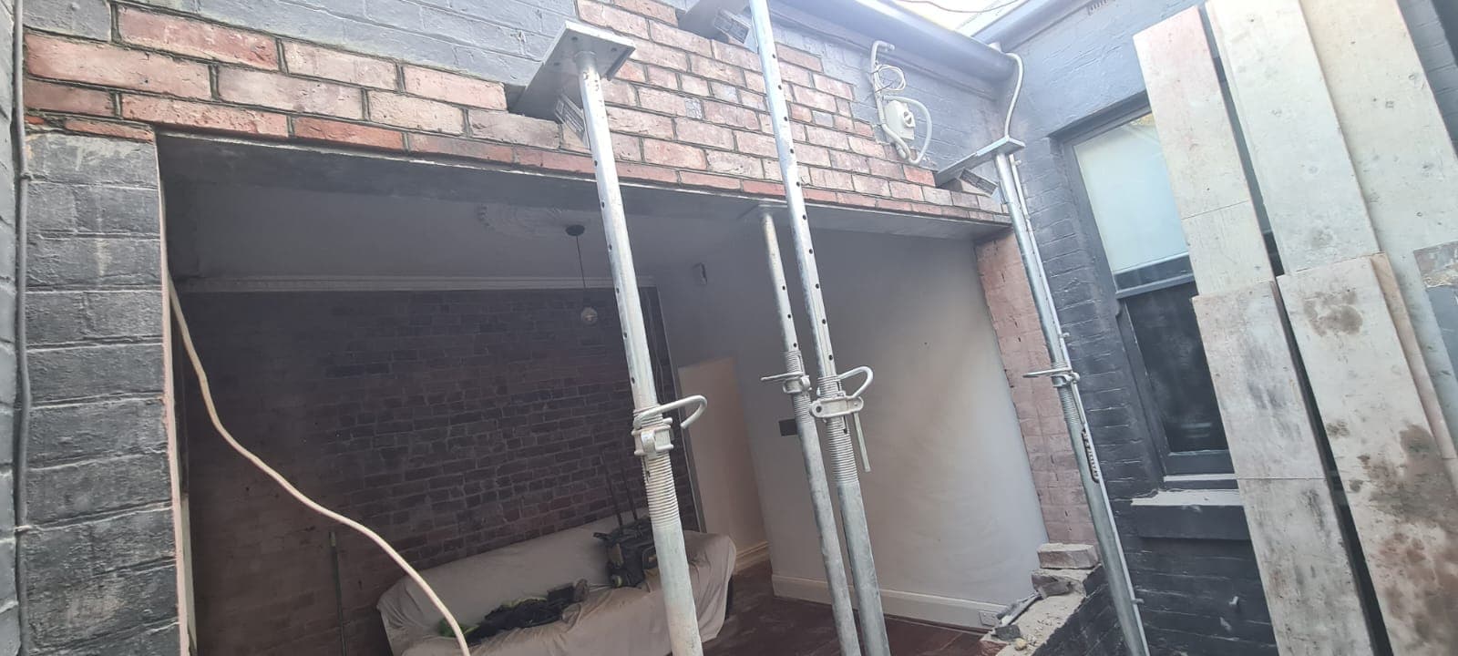 Structural opening propped and rebuilt in original brickwork during a Hawthorn heritage renovation