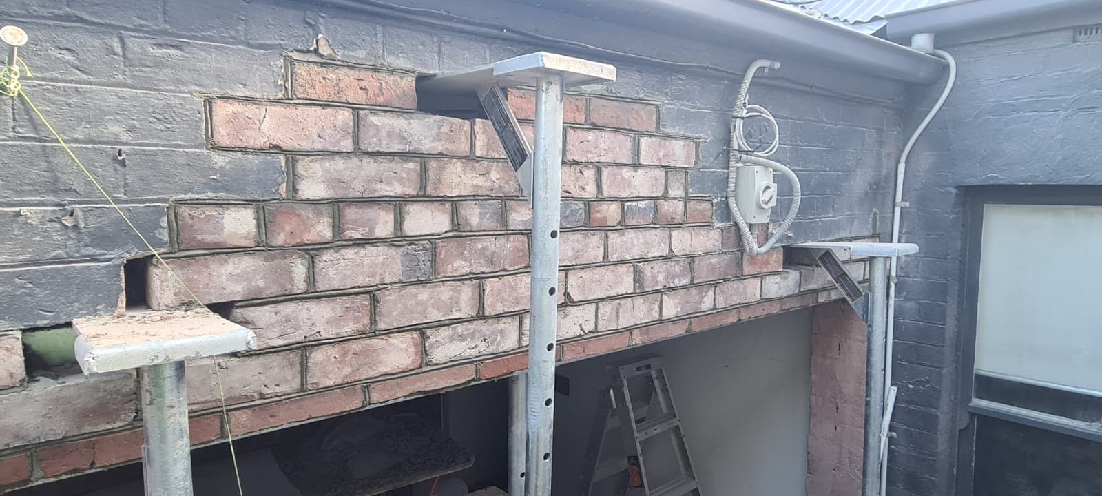Heritage brickwork rebuilt over a new opening in a Hawksburn period home by Goodwin Bricklaying