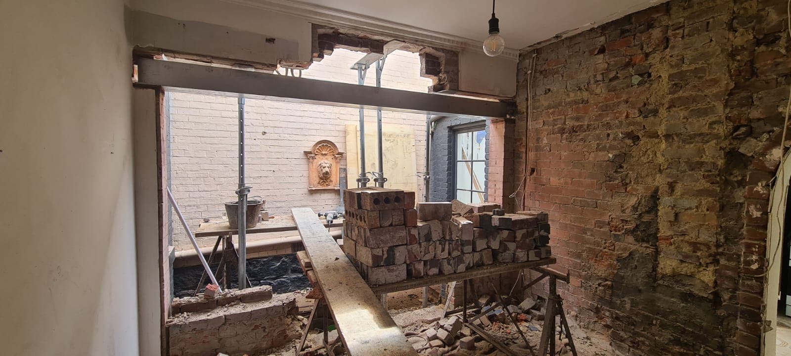 Steel reinforcement stabilising cracked heritage brickwork during remedial masonry in Camberwell by Goodwin Bricklaying