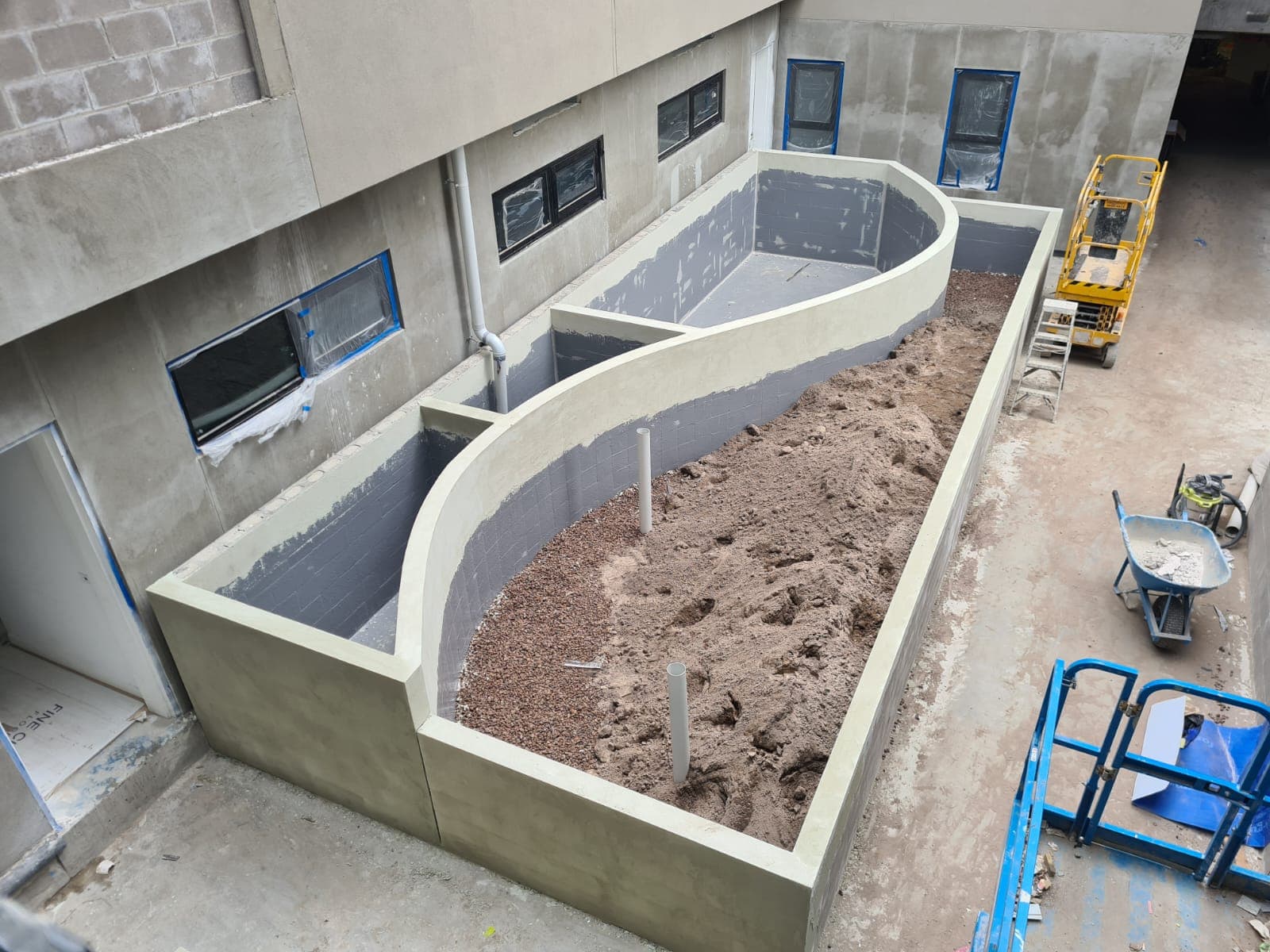 Rendered and waterproofed blockwork retaining wall for a Glen Iris property by Goodwin Bricklaying